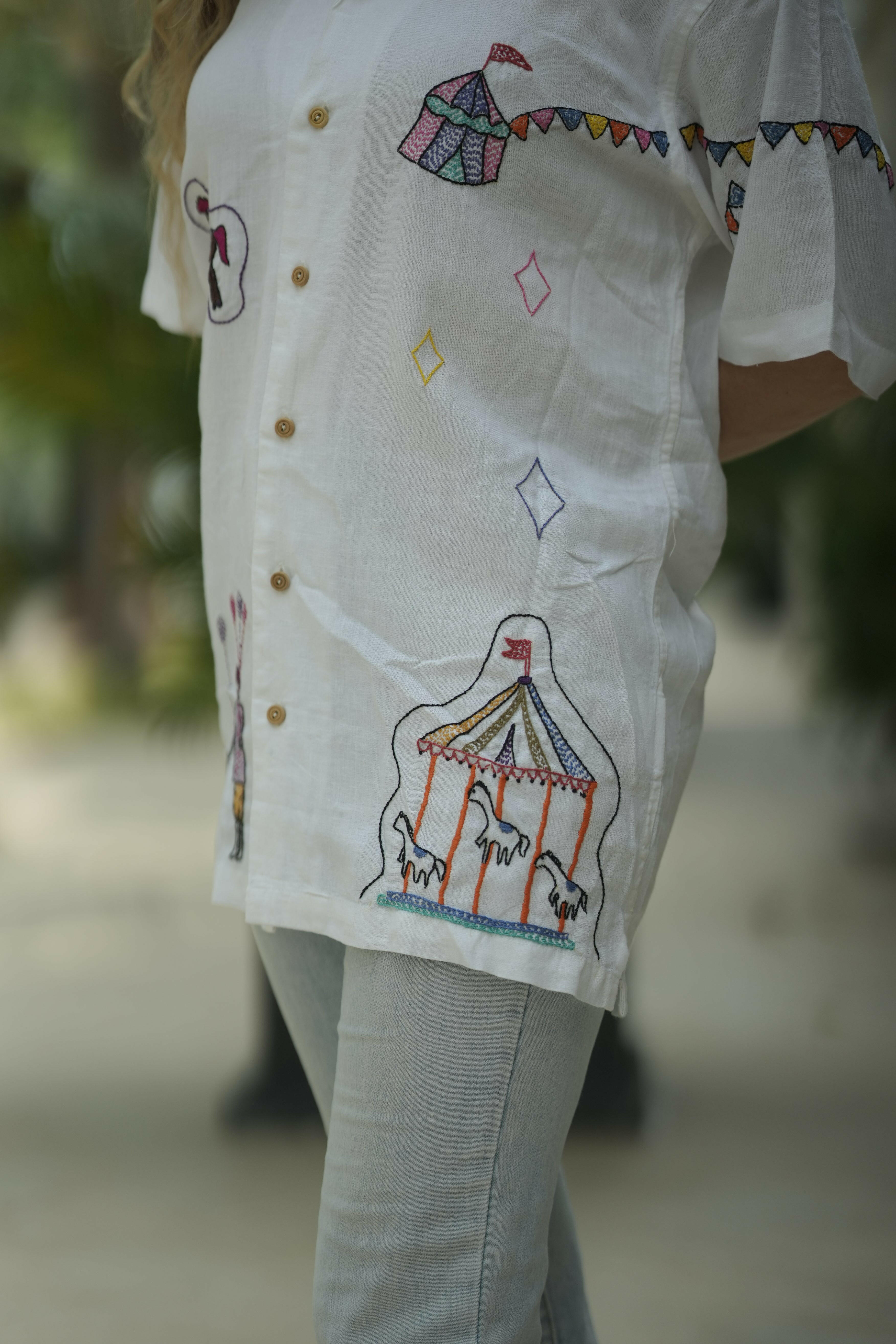 Unisex Designer white embroidered shirt with Festive Fairground Design