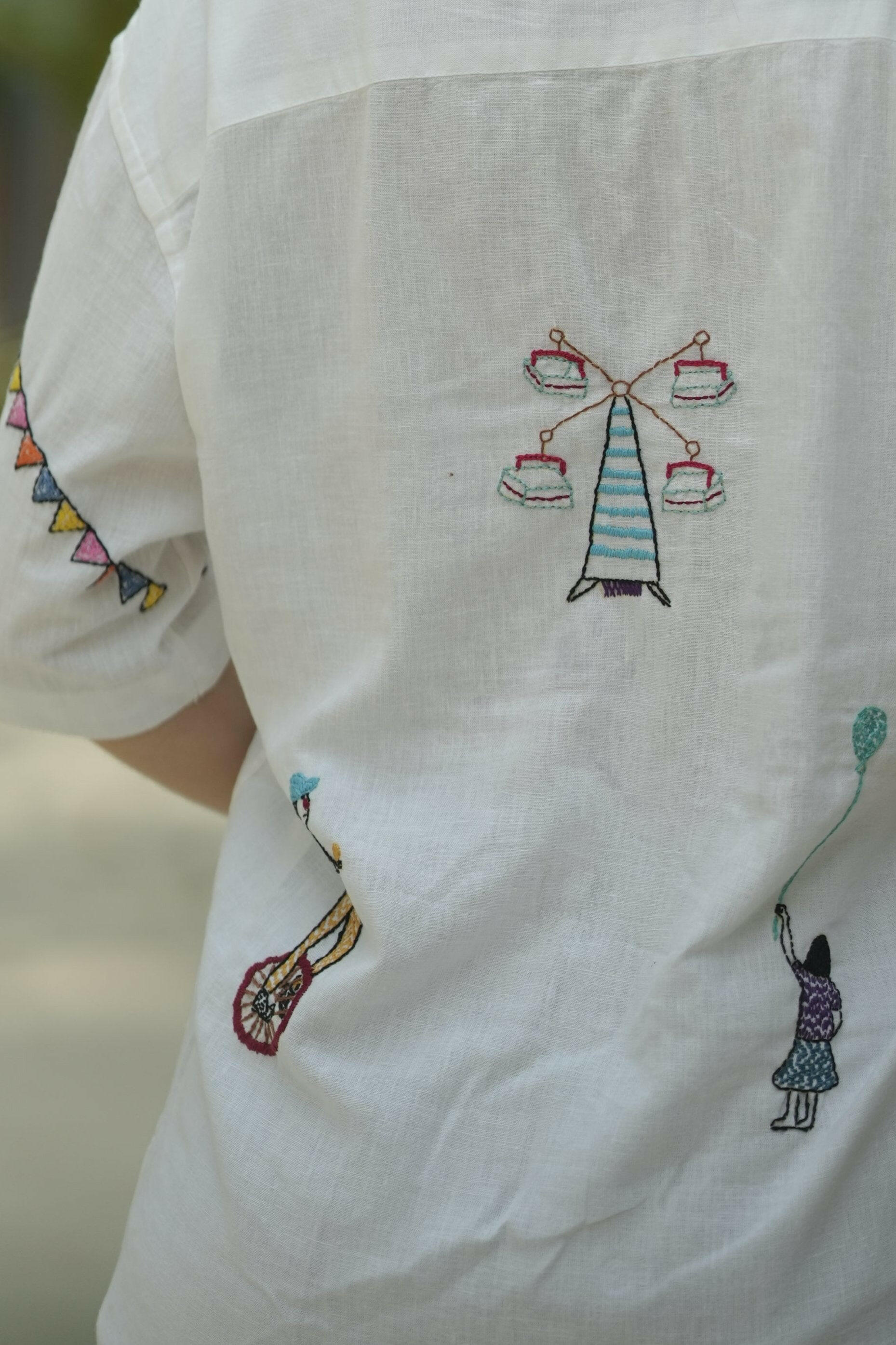 Unisex Designer white embroidered shirt with Festive Fairground Design